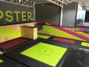 Yellow and pink custom trampolines for Jumpster indoor park in Monterrey, Mexico.