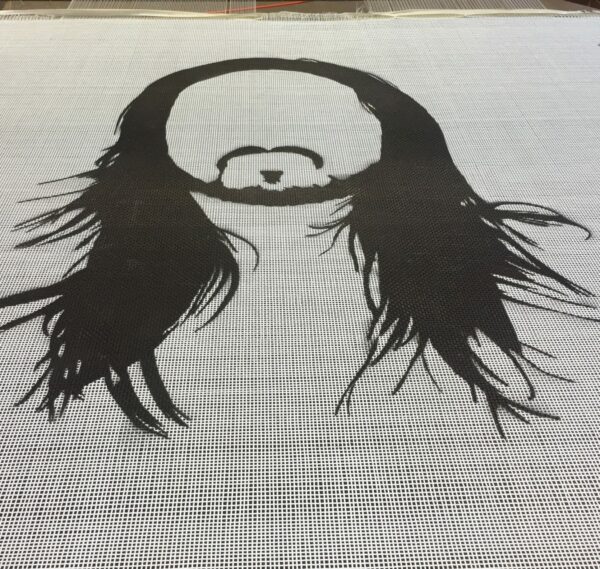 Custom trampoline beds can feature logos on 16 square feet of bed surface. A Steve Aoki (DJ) custom trampoline bed.