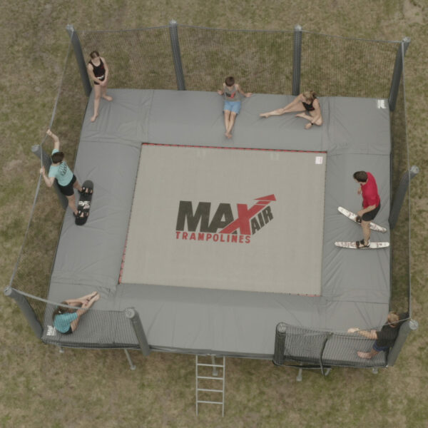 A group of people enjoying a trampoline.