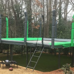 An above-ground, durable trampoline with safety netting.