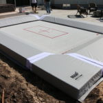 A pit set foundation lies beneath this completely installed MaxAir Trampolines kit.